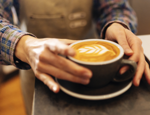 Bilden föreställer en kaffekopp med så kallad Latte-art.